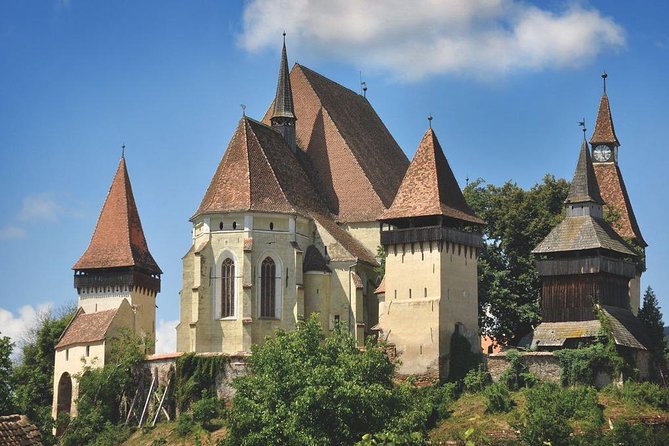 4-Day Private Tour of Transylvania from Bucharest - Day 1: Peles Castle and the medieval lanes of Brasov