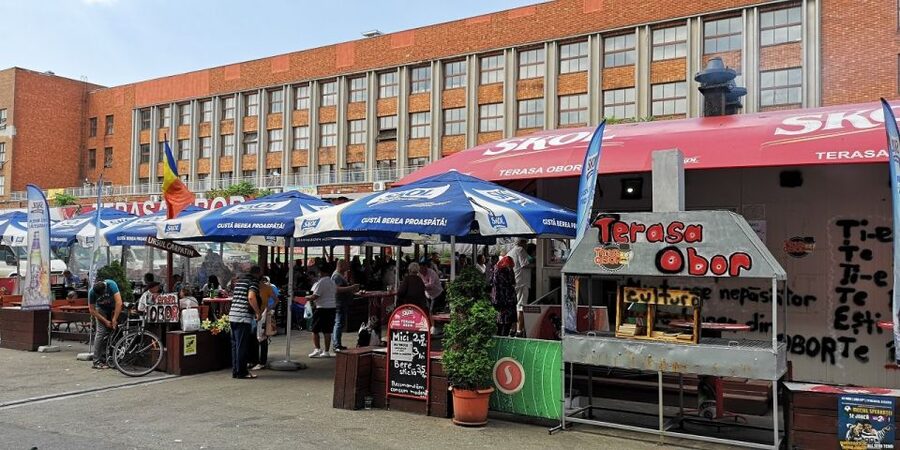 Bucharest: Street Food Tour with a Local Guide - From trolleybus to University Square