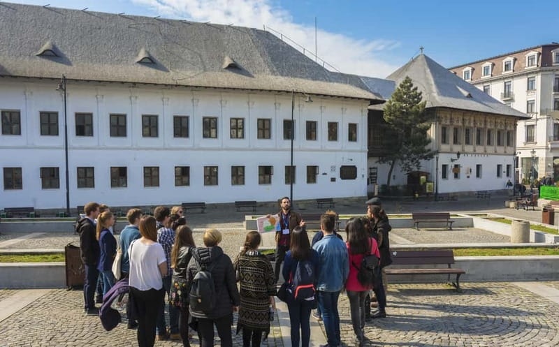 Bucharest: Tour of Old Town, Calea Victoriei & Communism - Starting beneath the Romanian Athenaeum