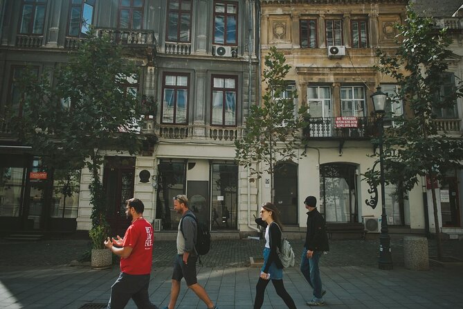 Discover Bucharest: Private Highlights and Traditional Food Tour - The Palace of the Parliament and the cost of grand plans