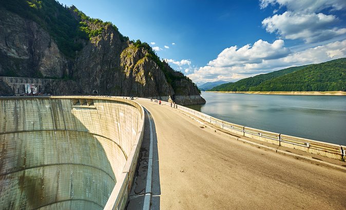 From Bucharest: Top Gear Road - Transfăgărășan Highway Day Trip - Vidraru Dam gives the day an impressive beginning
