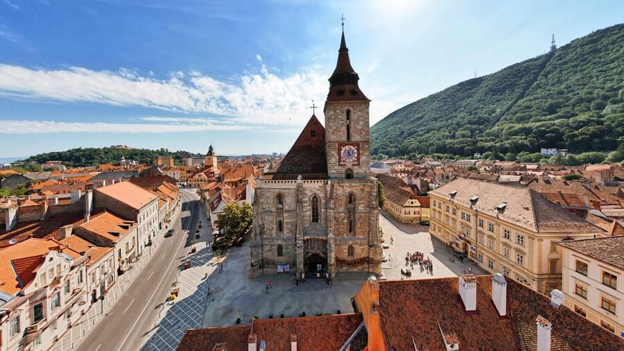 Minivan 8: Peles & Dracula's Castle and Brasov Full-Day Trip - Brașov’s old center after the castles