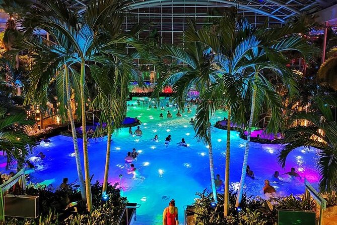 Transfer and Full Access All Day at Therme Spa Bucharest - Palm pools, loungers, and the swim-up bar